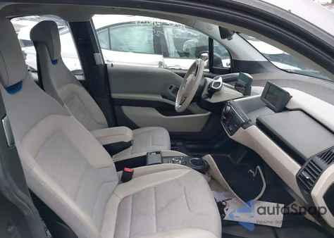 2015 BMW I3 Base W/Range Extender z USA, uszkodzony, nr VIN WBY1Z4C5XFV503568